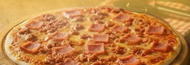 Pizza Toro ham, sausage and cheese pizza
